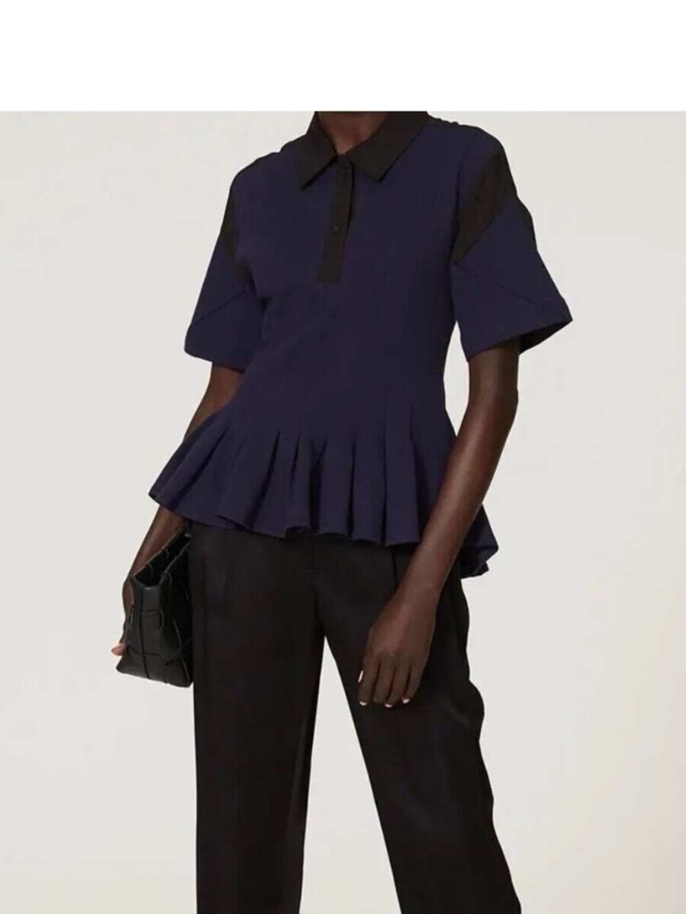 Women’s Navy Peplum Polo Blouse with Black Collar